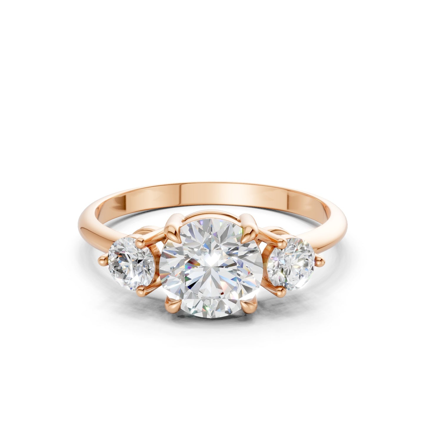 Frontal view of the Triple Shine 1.3 CT Diamond Ring in rose gold, showcasing a radiant trio of diamonds elegantly set in a softly glowing blush-toned band.