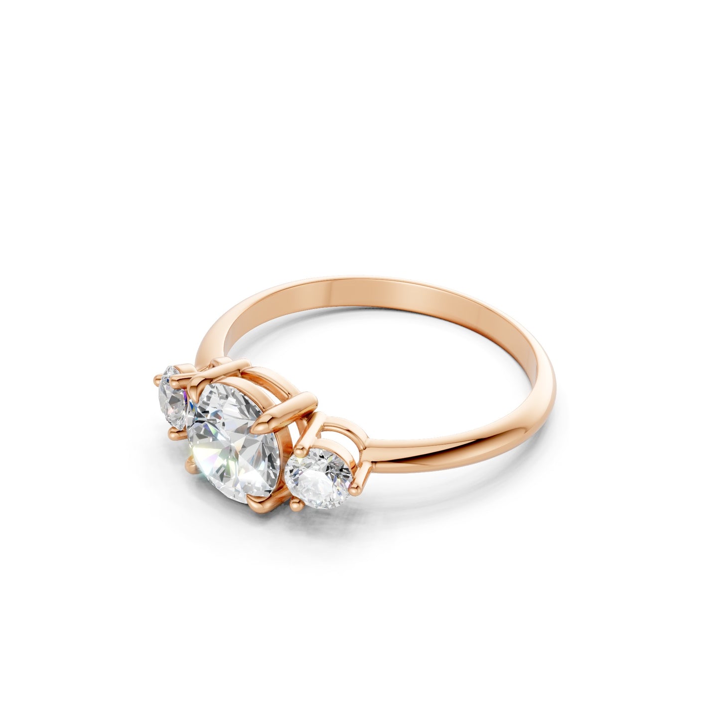Side profile revealing the gentle elevation of each diamond and the delicate curvature of the polished rose gold band.