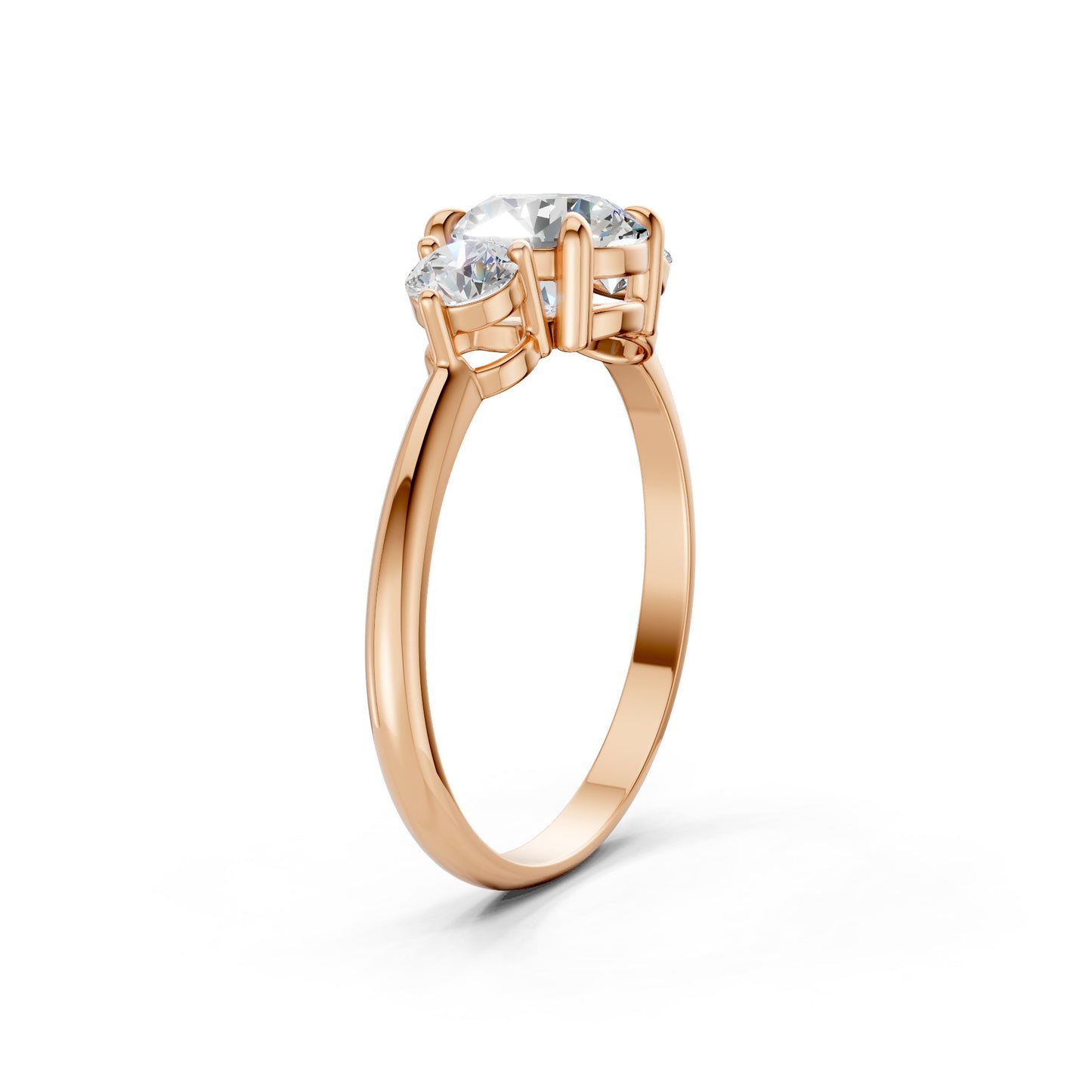 Top-down view highlighting the symmetrical layout of the triple diamonds set against the warm backdrop of rose gold.
