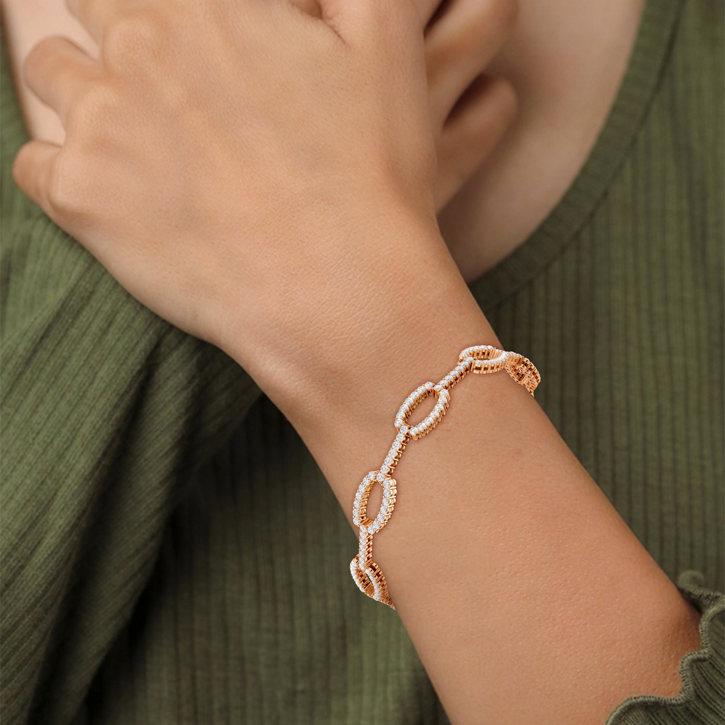A statement piece on the wrist, where the glowing rose gold links radiate strength and femininity.