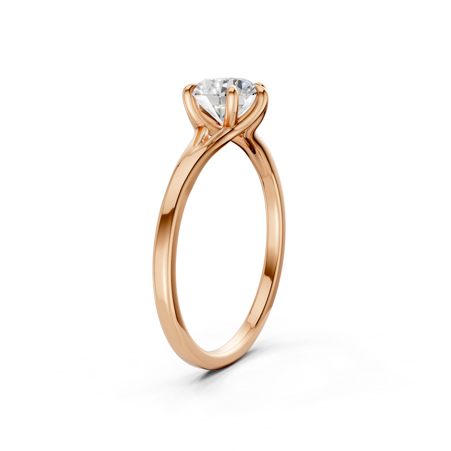 Worn gracefully, the radiant diamond reflects fire and warmth, accentuated by the soft pink hue of the rose gold band.