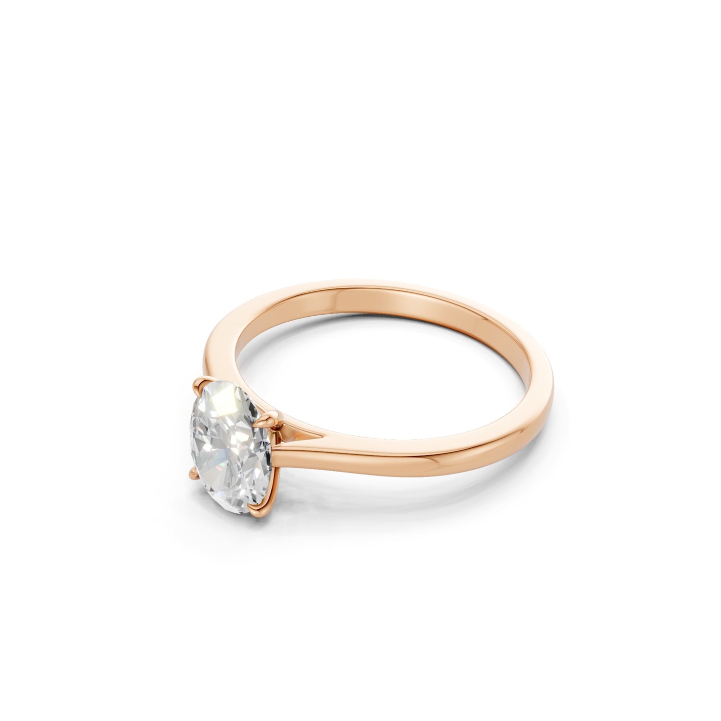 Side profile revealing the elevated setting of the center diamond and tapered side stones, delicately mounted on a polished rose gold band.