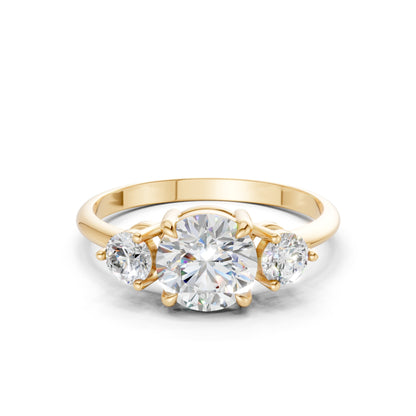 Frontal view of the Triple Shine 1.3 CT Diamond Ring in yellow gold, featuring three radiant diamonds that shine with harmony and classic golden warmth.