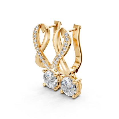 Side view of Infinity Embrace Diamond Earrings in 18K yellow gold, highlighting the graceful profile and embrace of 2.18 ct lab-grown diamonds in infinity design.
