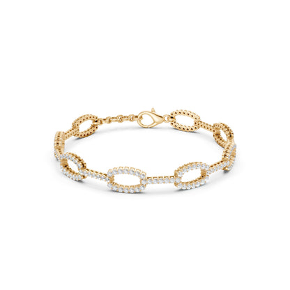 Bold front display of oval yellow gold links, fully pavé-set with 182 round diamonds totaling 3.27 CT, exuding architectural elegance.