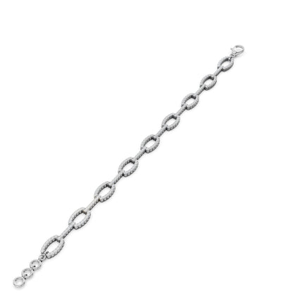 Flat-lay display of the bracelet, showing the rhythmic form and brilliance of every white gold link.