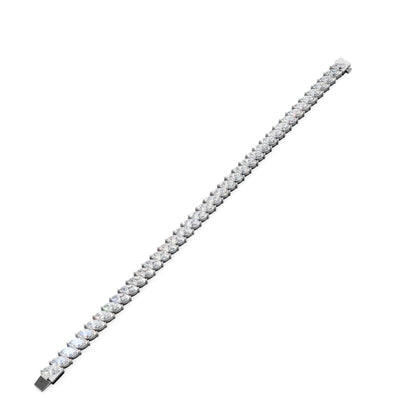 Extended view of the bracelet laid flat, revealing balance, proportion, and the sophistication of white gold brilliance.