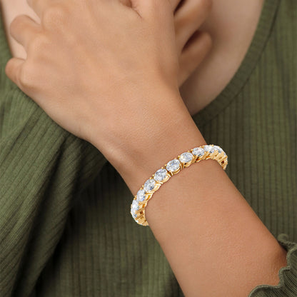 Elegant on the wrist, the bracelet pairs timeless gold with graceful brilliance.