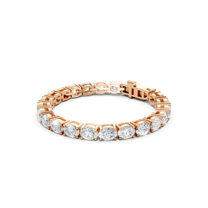 Side profile highlighting the prong settings and the soft pink glow of the rose gold structure.