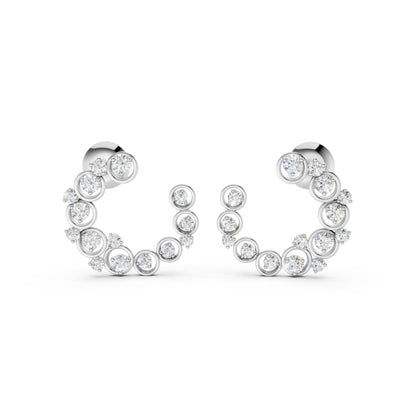 Close-up of Halo Arc earrings in white gold, set with 32 sparkling lab-grown diamonds totaling 0.57 CT, arranged in a graceful curved silhouette.