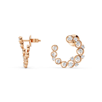 The pair displayed in harmony, showing the full curvature and gentle blush of polished rose gold.