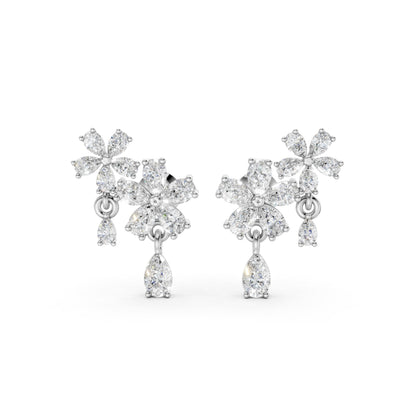 Front view of Floral Cascade Diamond Earrings in 18K white gold, showcasing 3.20 ct lab-grown pear-shaped diamonds in layered blossom clusters for cool, avant-garde elegance.