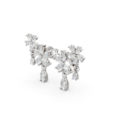 Side view of Floral Cascade Diamond Earrings in 18K white gold, highlighting the dimensional profile and graceful drop of 3.20 ct lab-grown pear-shaped diamonds.