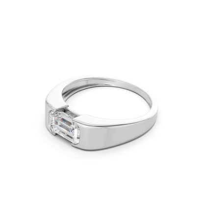 Profile shot highlighting the elegant lift of the four-prong setting and the clean curvature of the white gold band.
