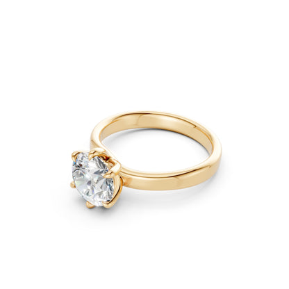 Profile shot highlighting the bold elevation of the 2.0 CT center stone and the rich tone of the yellow gold band.