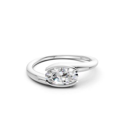 Frontal view of the Oval Embrace 1.00 CT Diamond Ring in white gold, highlighting the icy brilliance of the oval diamond against a cool-toned setting.