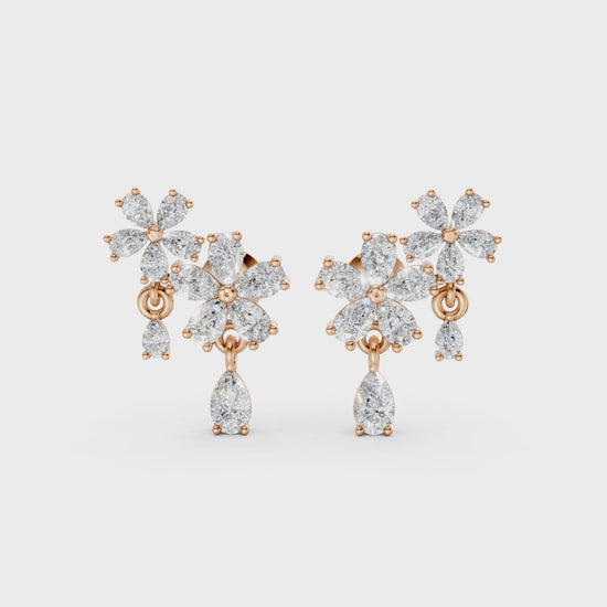 Short video of Floral Cascade Diamond Earrings in 18K rose gold, featuring 3.20 ct lab-grown diamonds, rotating to showcase the warm hue and sparkling layered blossom design.
