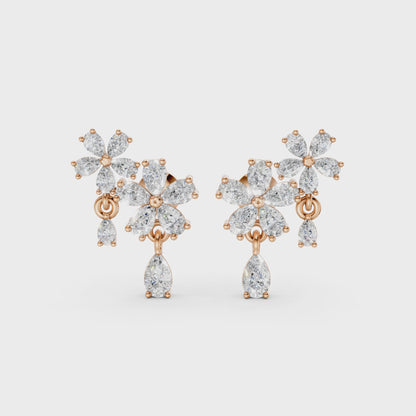 Short video of Floral Cascade Diamond Earrings in 18K rose gold, featuring 3.20 ct lab-grown diamonds, rotating to showcase the warm hue and sparkling layered blossom design.