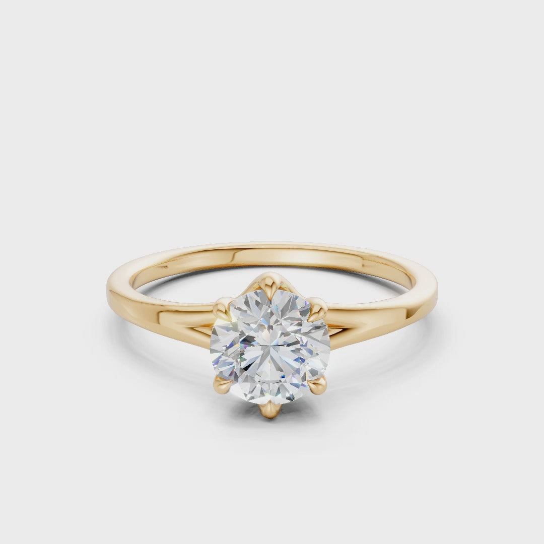 Rotating footage revealing multi-directional sparkle from the radiant cut and the lustrous golden tone of the band.