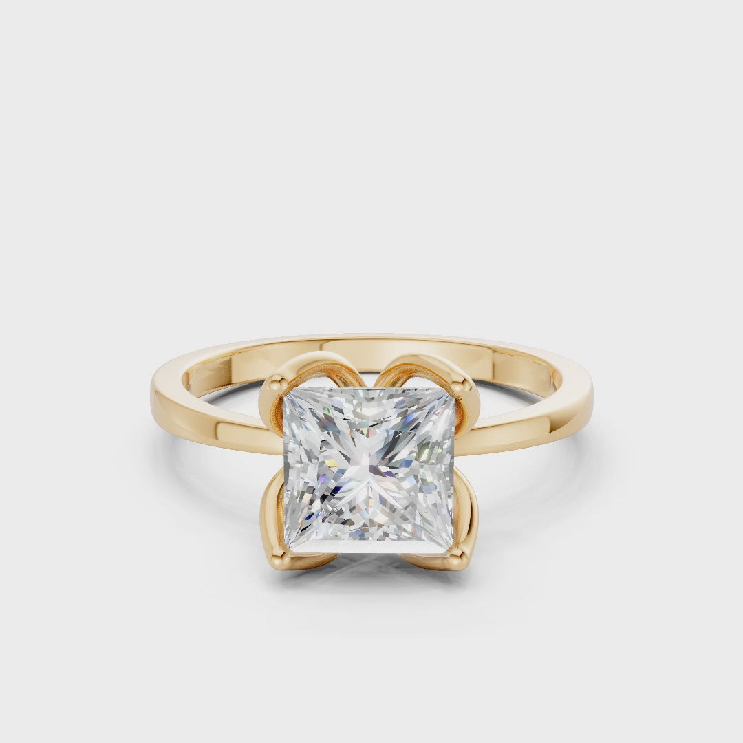 Smooth cinematic rotation highlighting the play of light across the diamond’s sharp facets and the lustrous sheen of yellow gold.