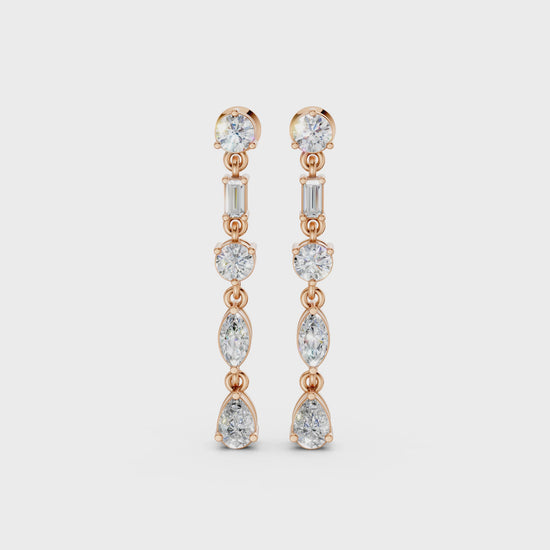 Short video of Linear Radiance Drop Earrings in 18K rose gold, featuring 1.80 ct lab-grown diamonds, rotating to showcase the warm hue and sparkling refined motion.