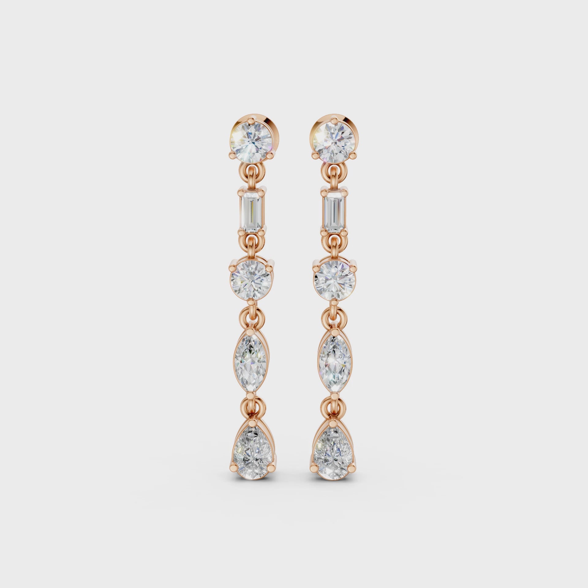 Short video of Linear Radiance Drop Earrings in 18K rose gold, featuring 1.80 ct lab-grown diamonds, rotating to showcase the warm hue and sparkling refined motion.