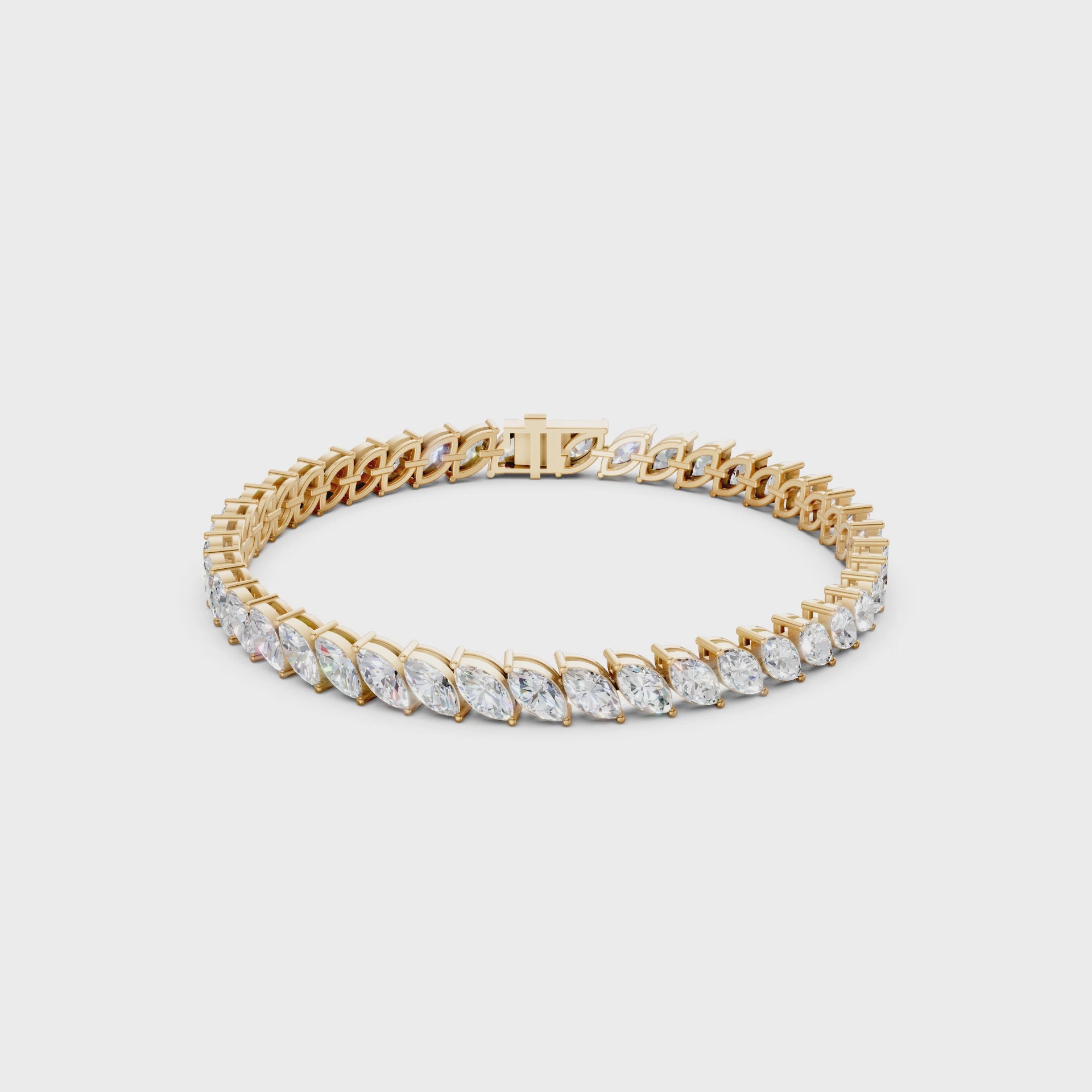 360° rotation capturing the harmony of light and structure between golden links and sparkling marquise stones.