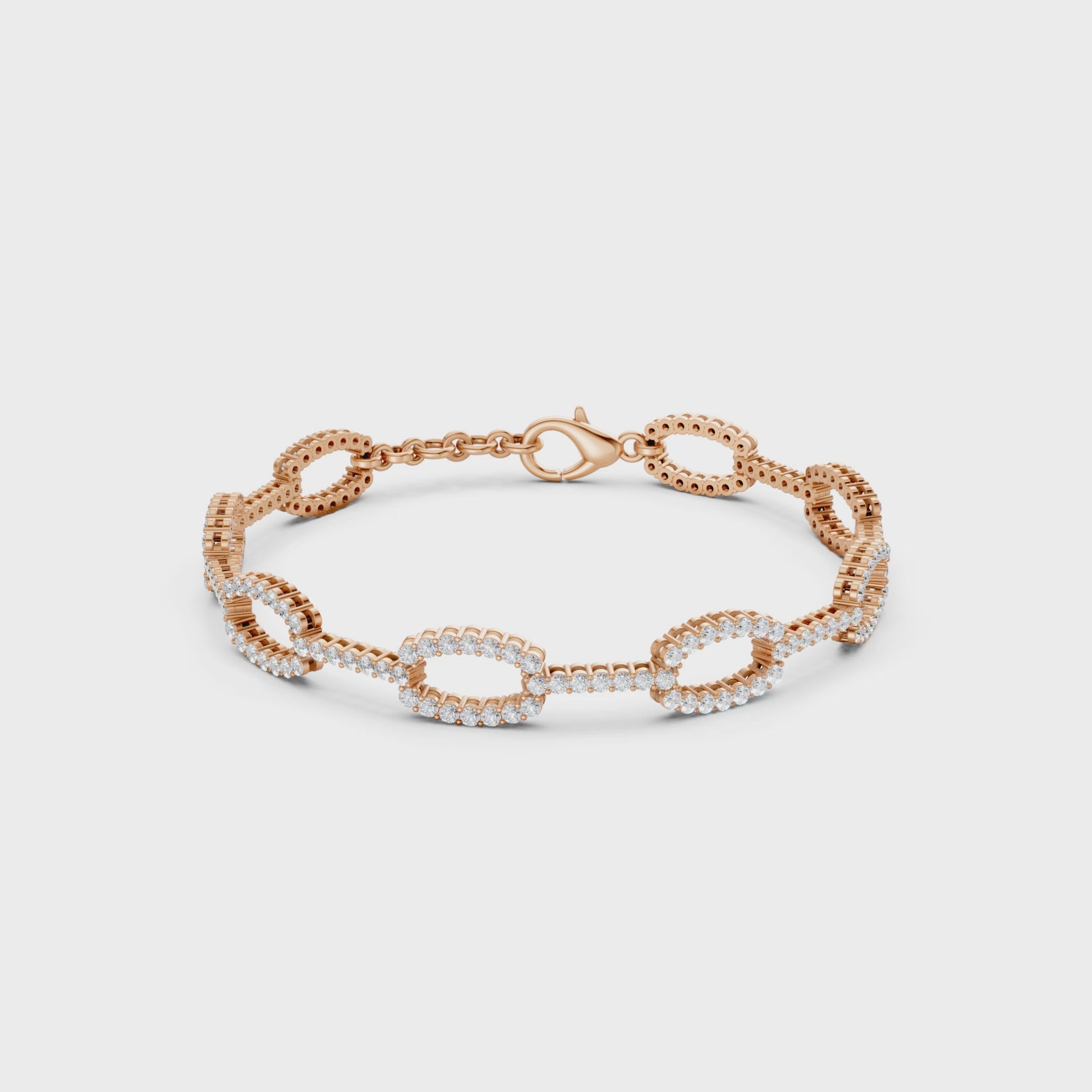 Dynamic video view revealing every facet of rose gold links and diamonds in a dance of light and motion.