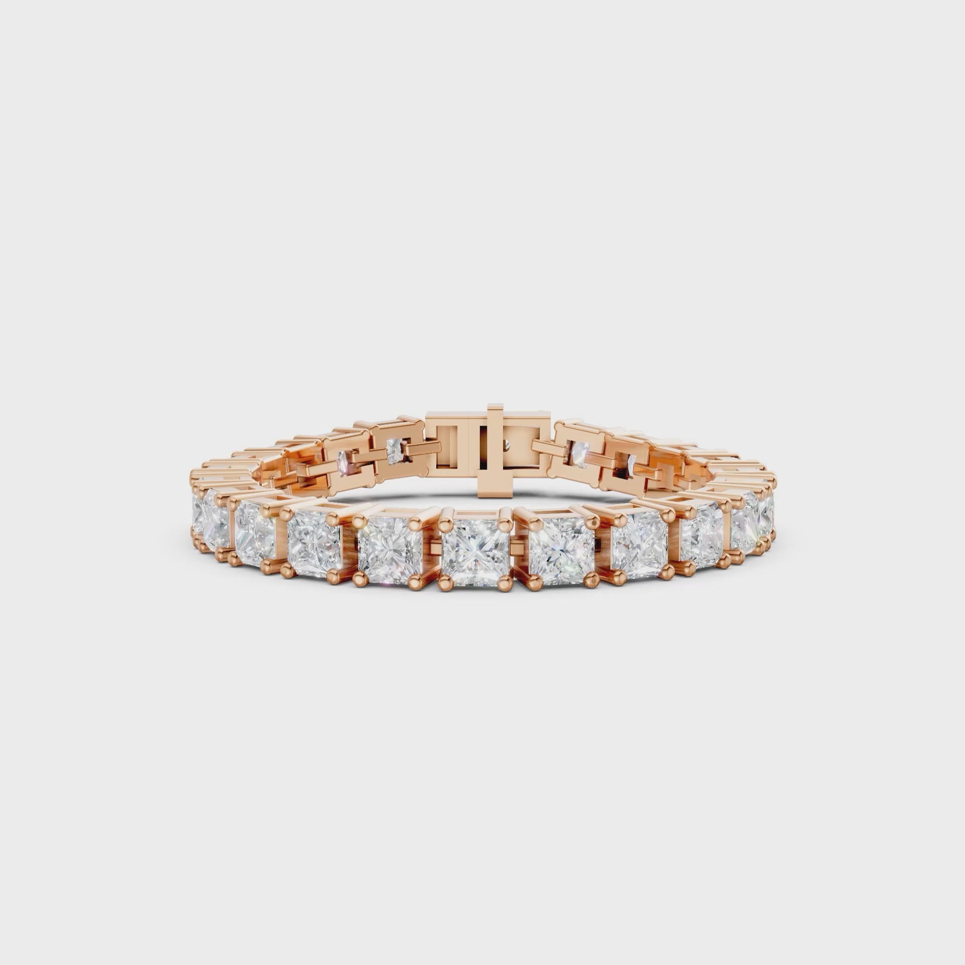 360° rotation capturing the striking sparkle of princess cuts and the luminous reflection of polished rose gold.