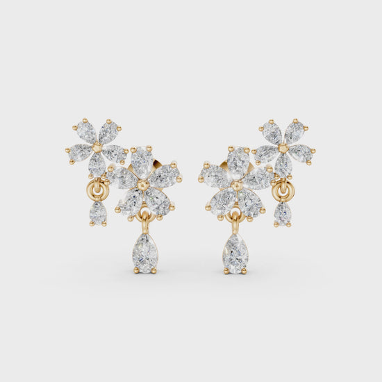 Short video of Floral Cascade Diamond Earrings in 18K yellow gold, featuring 3.20 ct lab-grown diamonds, rotating to showcase the rich hue and sparkling layered blossom design.