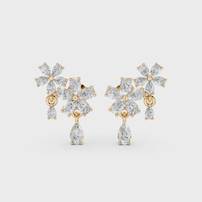 Short video of Floral Cascade Diamond Earrings in 18K yellow gold, featuring 3.20 ct lab-grown diamonds, rotating to showcase the rich hue and sparkling layered blossom design.