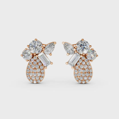 Short video of Modern Teardrop Cluster Diamond Earrings in 18K rose gold, featuring 2.368 ct lab-grown diamonds, rotating to showcase the warm hue and sparkling teardrop cluster.