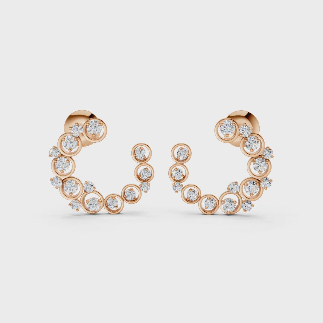 Graceful slow-motion spin highlighting the earrings’ dimensional curve, shimmering stones, and rich rose gold tones.