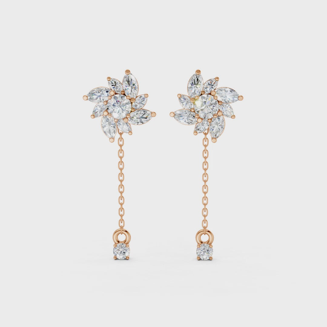 Short video of Floral Drop Earrings in 18K rose gold, featuring 1.85 ct petal-shaped diamonds, rotating to showcase the warm rose gold and sparkling floral design.