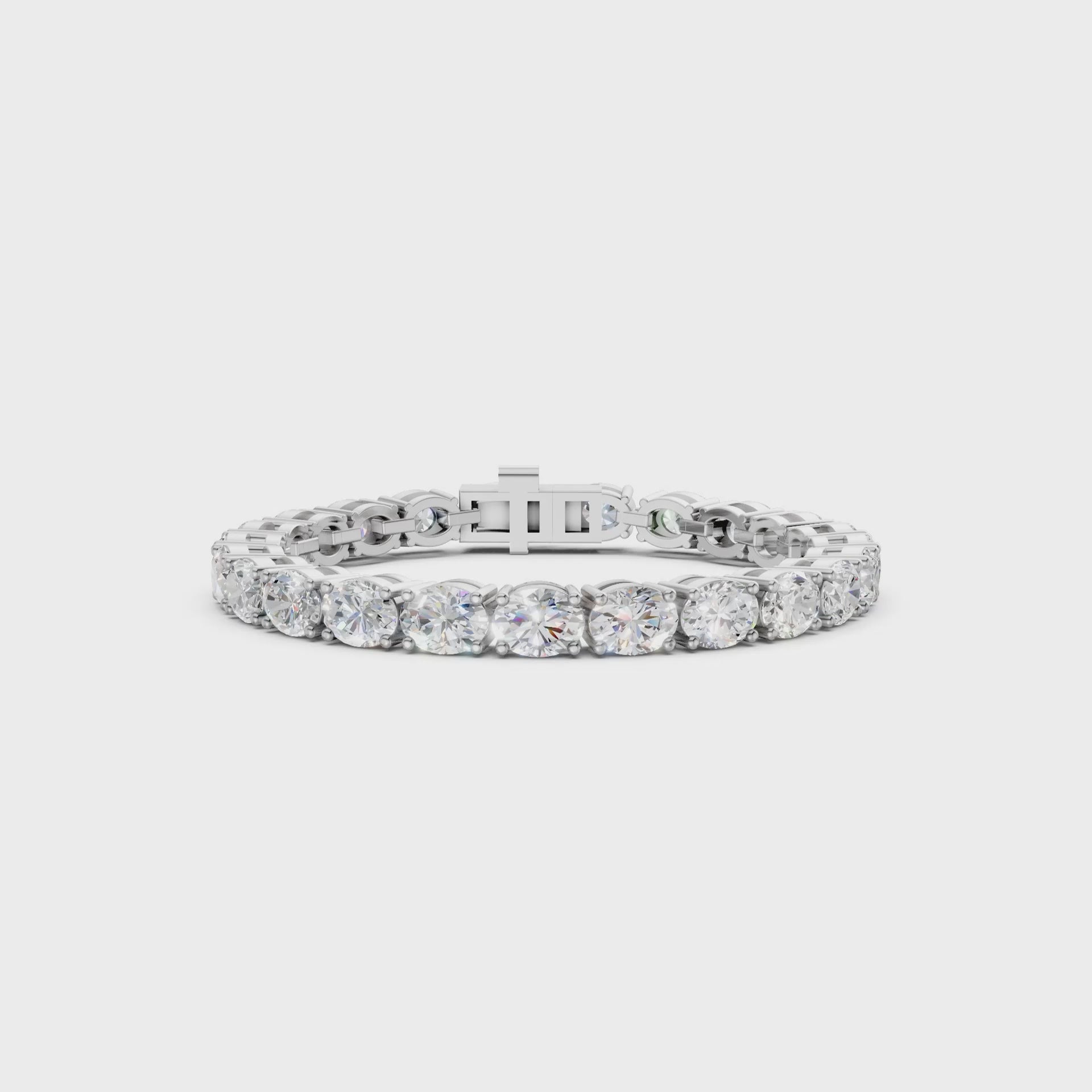 Smooth rotation revealing crisp sparkle and the pristine polish of white gold.