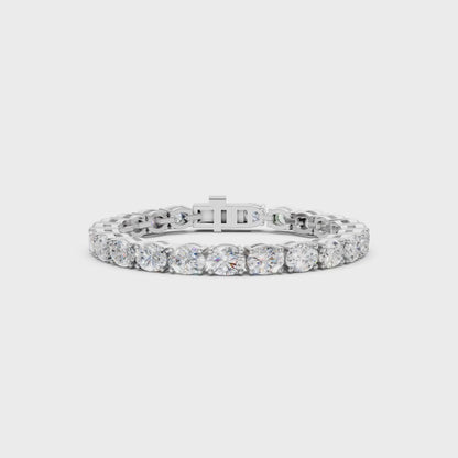 Smooth rotation revealing crisp sparkle and the pristine polish of white gold.
