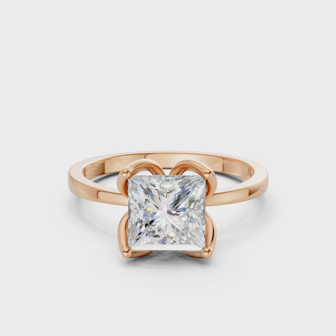 Smooth cinematic rotation highlighting the play of light across the diamond’s sharp facets and rose gold’s velvety sheen.