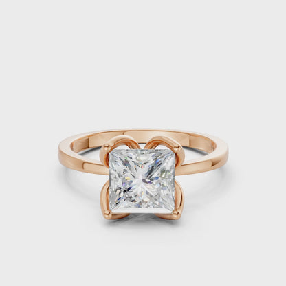 Smooth cinematic rotation highlighting the play of light across the diamond’s sharp facets and rose gold’s velvety sheen.