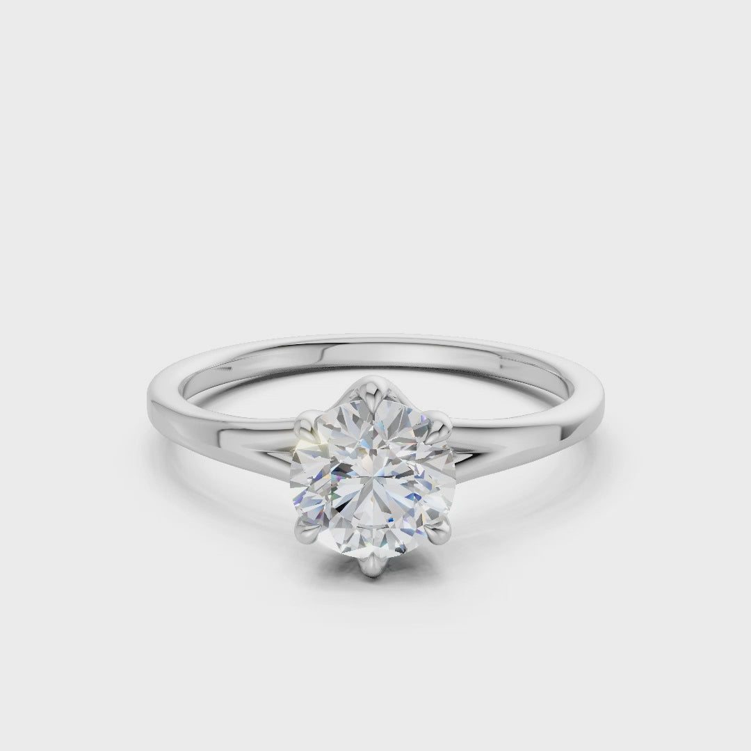 360° motion revealing the diamond’s internal fire and the refined brilliance of the white gold setting.