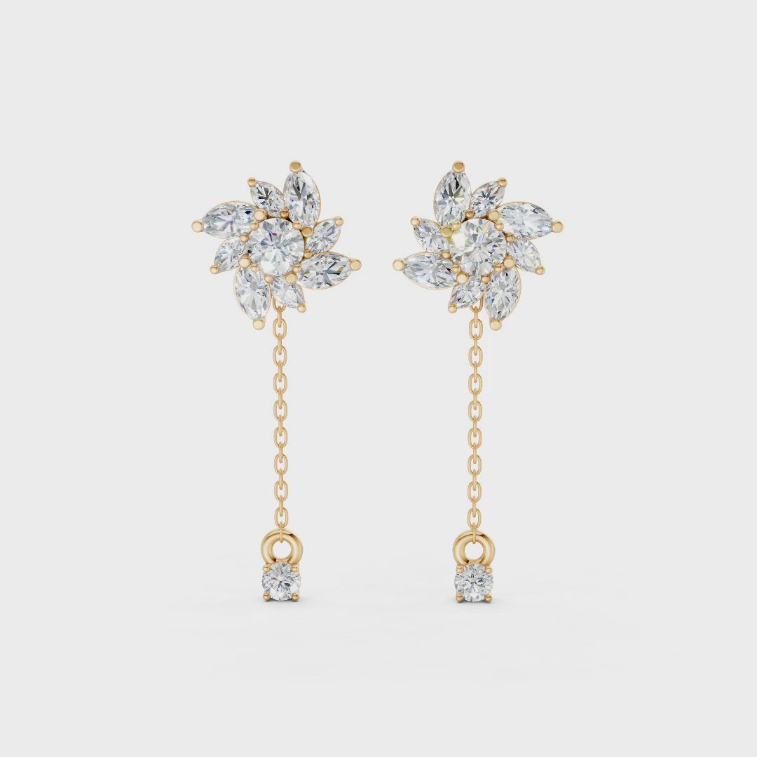 Short video of Floral Drop Earrings in 18K yellow gold, featuring 1.85 ct petal-shaped diamonds, rotating to display the vibrant gold and floral sparkle.