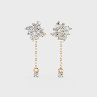 Short video of Floral Drop Earrings in 18K yellow gold, featuring 1.85 ct petal-shaped diamonds, rotating to display the vibrant gold and floral sparkle.