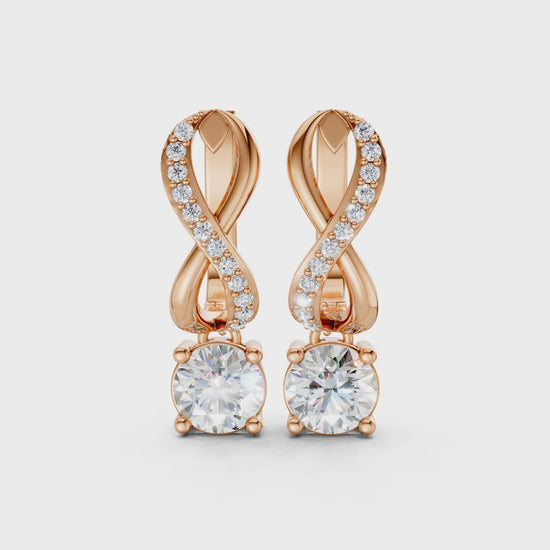 Short video of Infinity Embrace Diamond Earrings in 18K rose gold, featuring 2.18 ct lab-grown diamonds, rotating to showcase the warm hue and sparkling infinity motif.