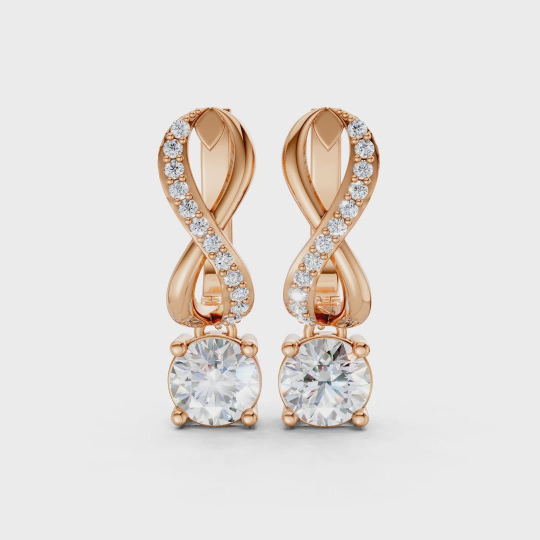Short video of Infinity Embrace Diamond Earrings in 18K rose gold, featuring 2.18 ct lab-grown diamonds, rotating to showcase the warm hue and sparkling infinity motif.