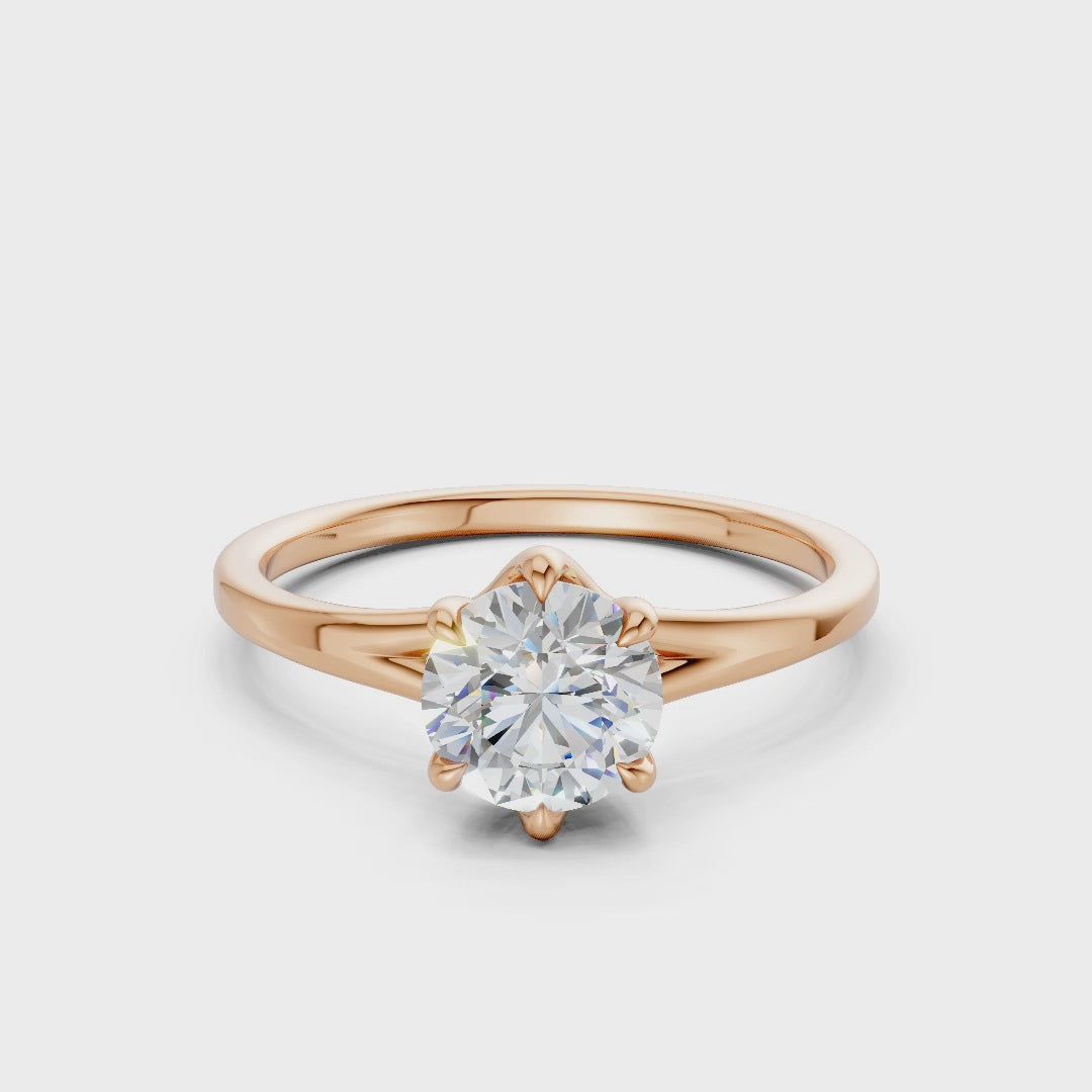 360° rotating video capturing the fiery sparkle of the radiant cut and the tender gleam of the rose gold finish.