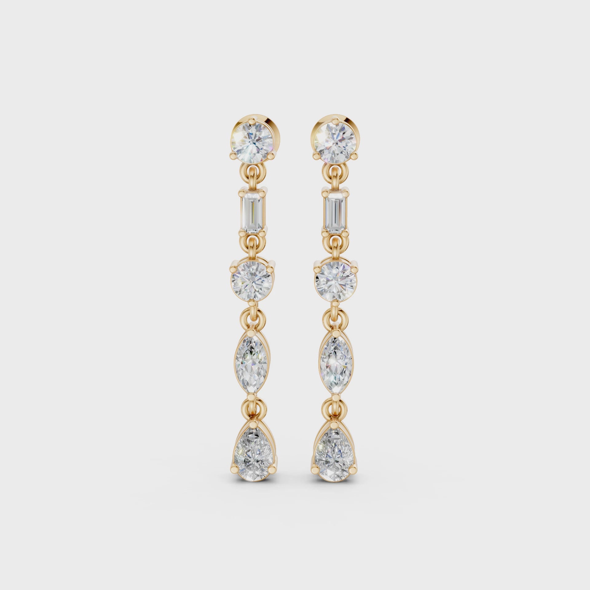 Short video of Linear Radiance Drop Earrings in 18K yellow gold, featuring 1.80 ct lab-grown diamonds, rotating to showcase the vibrant hue and sparkling refined motion.