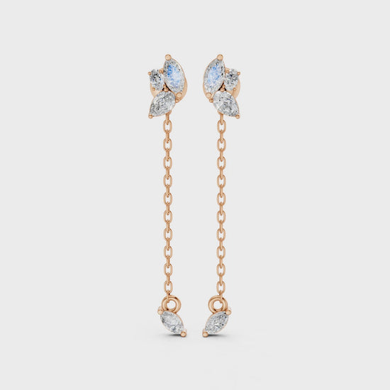 Video showcasing Marquise Drop Chain Earrings in 14k/18k white, yellow, rose gold, and premium platinum, featuring 0.92 CT lab-grown diamonds. Displays front, side, and full views, highlighting the airy chain drop, floral-inspired design, and subtle sparkle in motion.