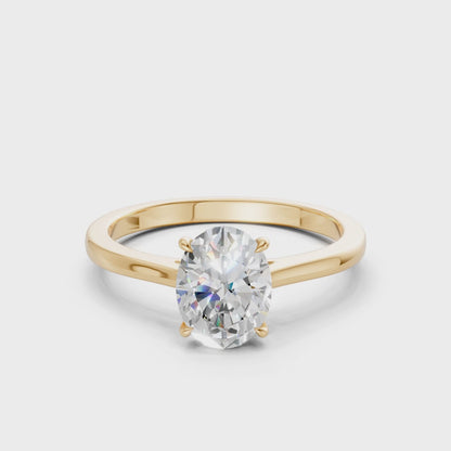 Rotating footage revealing every angle of the oval brilliance and the luminous flow of the yellow gold band.