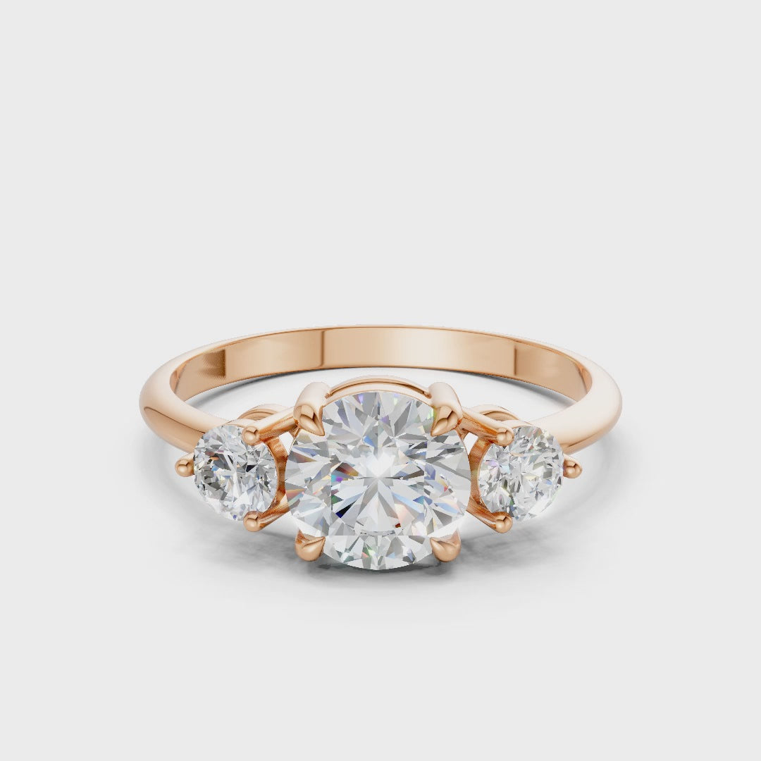 360° rotation capturing the dazzling light play of each diamond and the soft shimmer of the rose gold band.