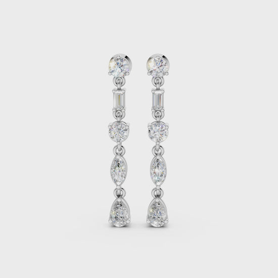 Short video of Linear Radiance Drop Earrings in 18K white gold, featuring 1.80 ct lab-grown diamonds, rotating to showcase the cool hue and sparkling refined motion.