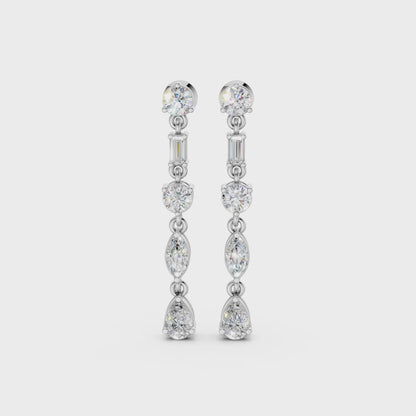 Short video of Linear Radiance Drop Earrings in 18K white gold, featuring 1.80 ct lab-grown diamonds, rotating to showcase the cool hue and sparkling refined motion.
